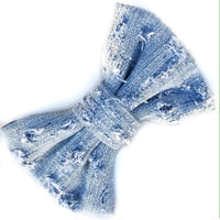 DISTRESSED DENIM BOW